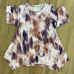 Great condition Vera Wang Asymmetrical top. Longer on sides.  Machine washable